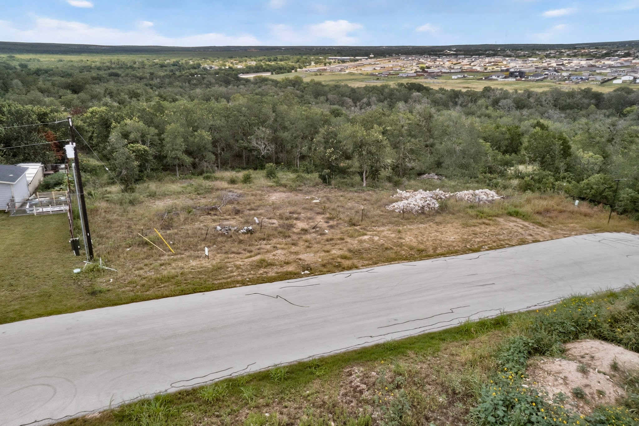 693 Santa Teresa Road Kyle, TX 78640 - Photo 13 of 20 A spacious lot provides ample opportunity to build your dream home amidst natural surroundings.