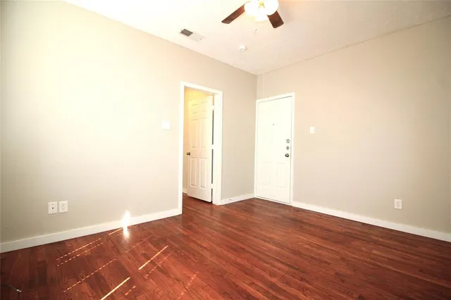 a view of an empty walk in closet