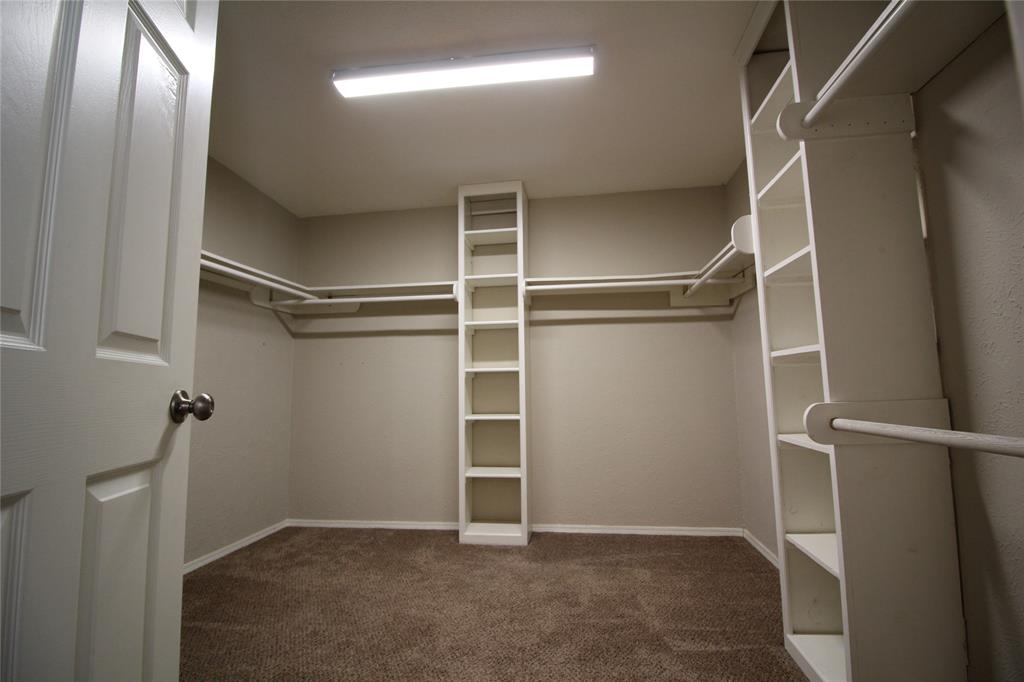 2309 Wesley Street, Unit D Greenville, TX 75401 - Photo 13 of 16 a view of an empty walk in closet