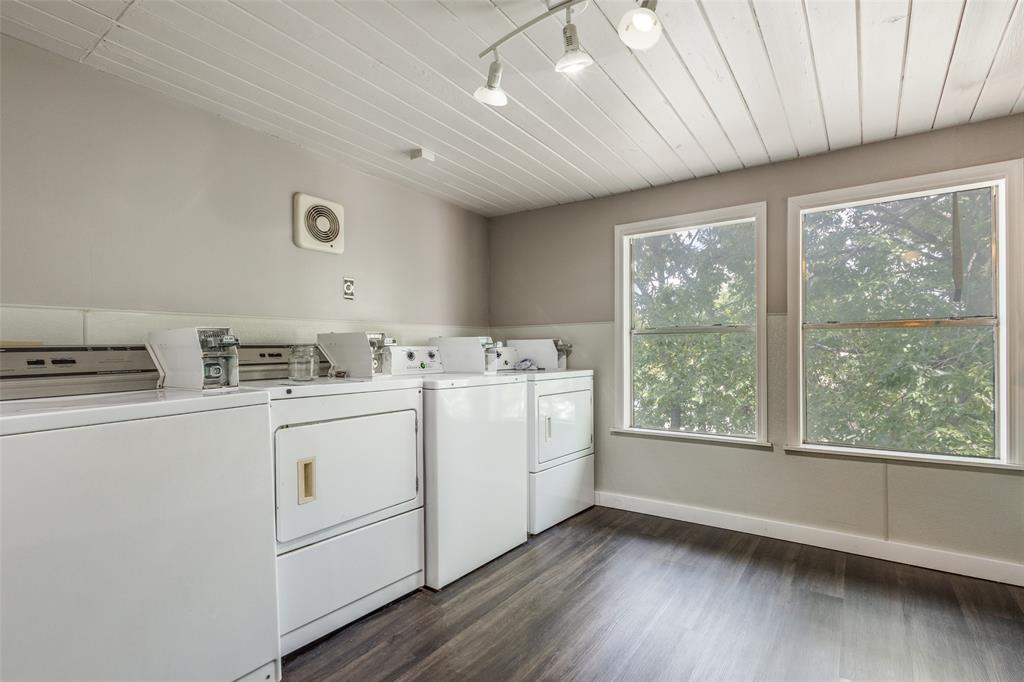 2309 Wesley Street, Unit D Greenville, TX 75401 - Photo 15 of 16 a room with dryer and washer