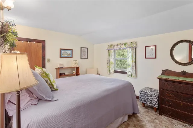 a bathroom with a sink bathtub and a mirror