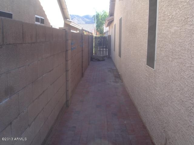 920 East Harwell Road Phoenix, AZ 85042 - Photo 32 of 33 Backyd9 Side Yard Brick