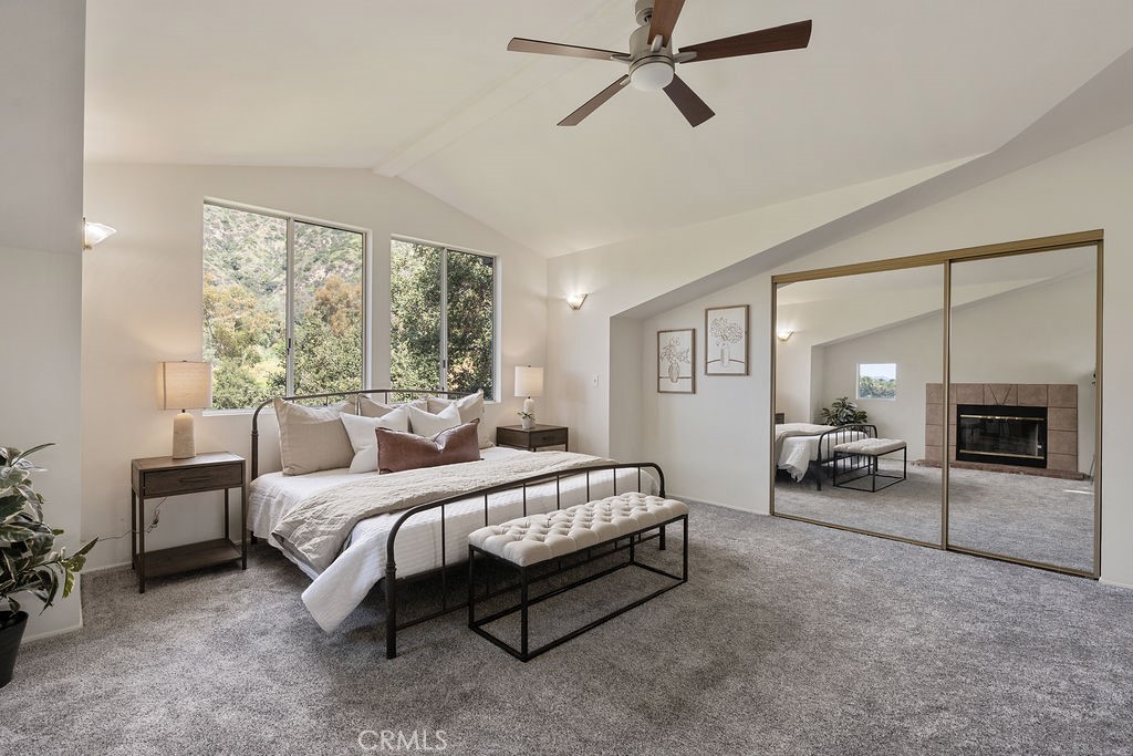 235 Spinks Canyon Road Duarte, CA 91010 - Photo 34 of 62 a bedroom with a bed couch and a window