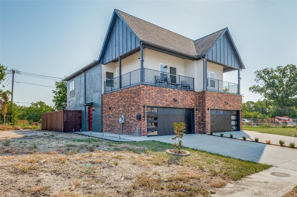 2404 & 2406 Merlin Street Dallas, TX 75215 - Photo 1 of 1 a front view of a house with garden