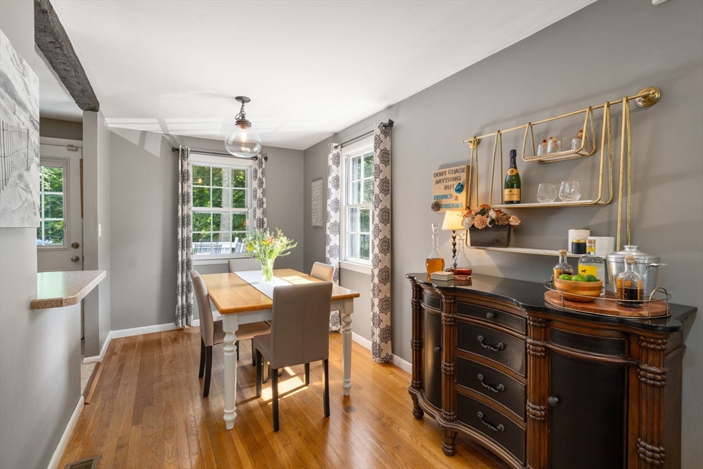 330 Gorwin Drive Holliston, MA 01746 - Photo 11 of 27 a view of a dining room with furniture window and wooden floor