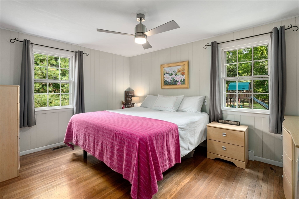 330 Gorwin Drive Holliston, MA 01746 - Photo 13 of 27 a bedroom with a bed and a large window