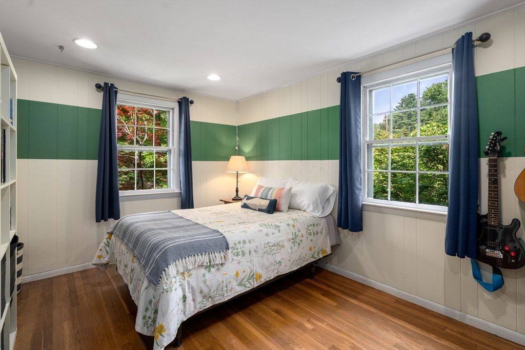 330 Gorwin Drive Holliston, MA 01746 - Photo 14 of 27 a bedroom with a large bed and a flat tv screen on dresser