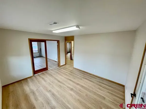 a view of an empty room and window