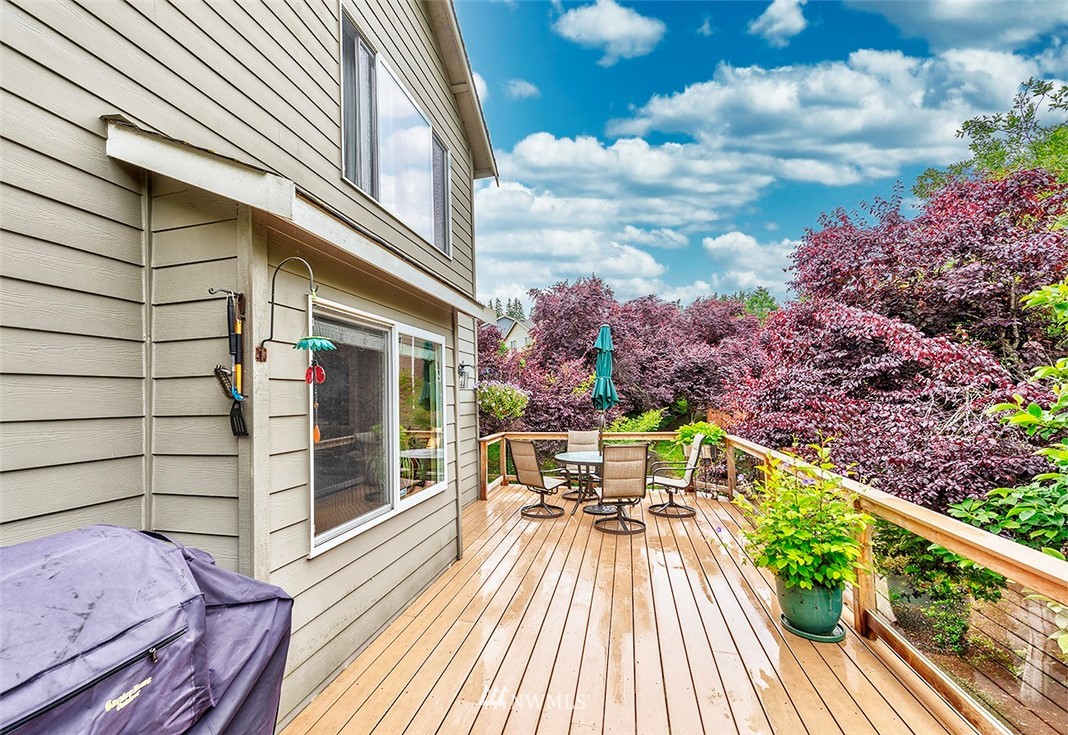 17029 4th Avenue Southeast Bothell, WA 98012 - Photo 19 of 23 a view of a patio with a table and chairs
