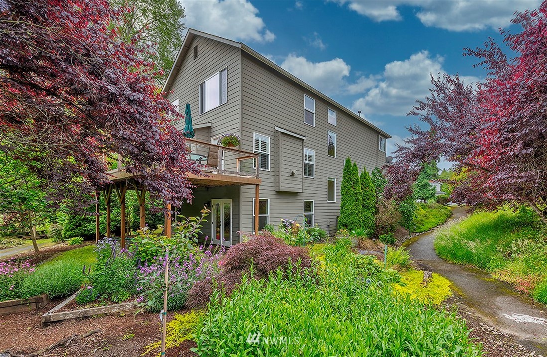 17029 4th Avenue Southeast Bothell, WA 98012 - Photo 20 of 23 a front view of a house with a yard