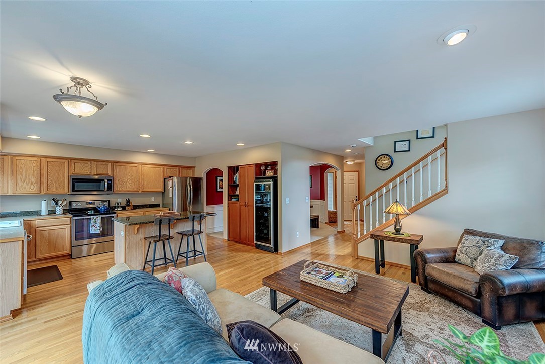17029 4th Avenue Southeast Bothell, WA 98012 - Photo 5 of 23 a living room with furniture and a flat screen tv