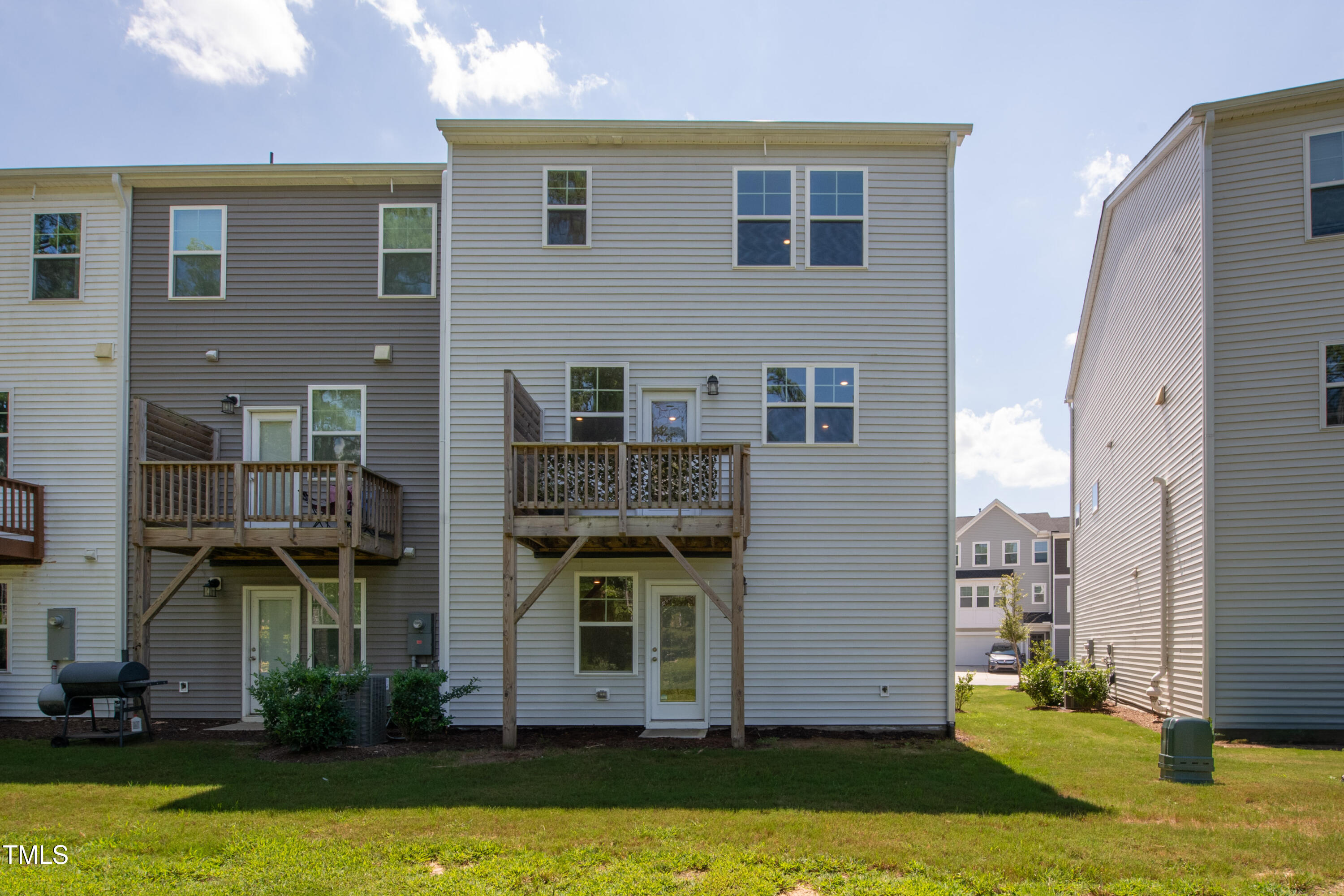1032 Shoreside Drive Durham, NC 27713 - Photo 25 of 31 a front view of house with yard and garage