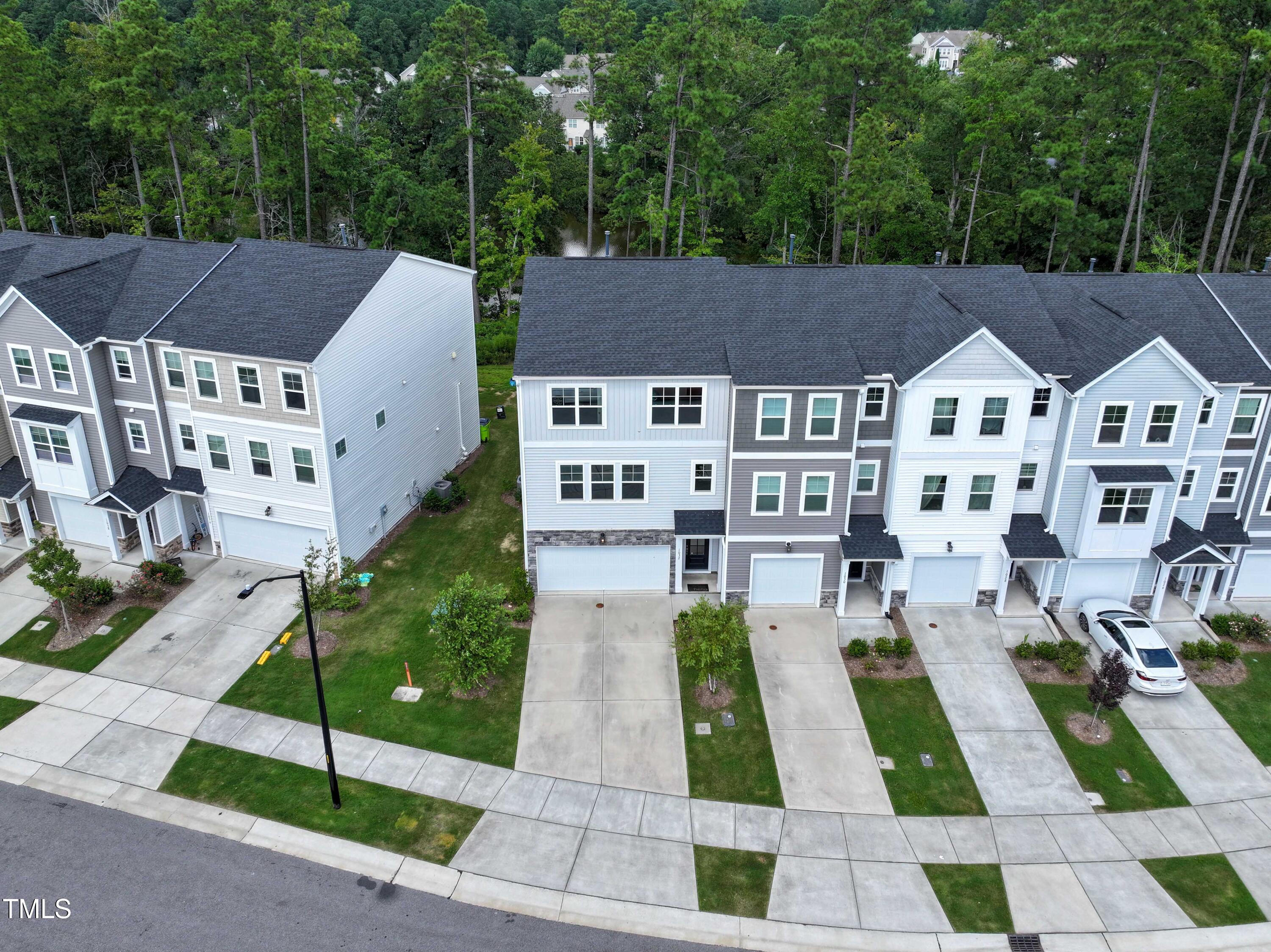 1032 Shoreside Drive Durham, NC 27713 - Photo 28 of 31 a aerial view of a house with a garden