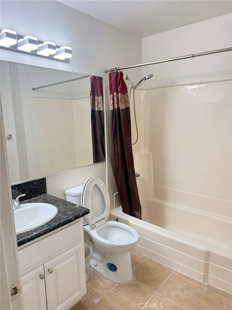 77 North Michigan Avenue, Unit 3 Pasadena, CA 91106 - Photo 8 of 10 a bathroom with a sink toilet and shower