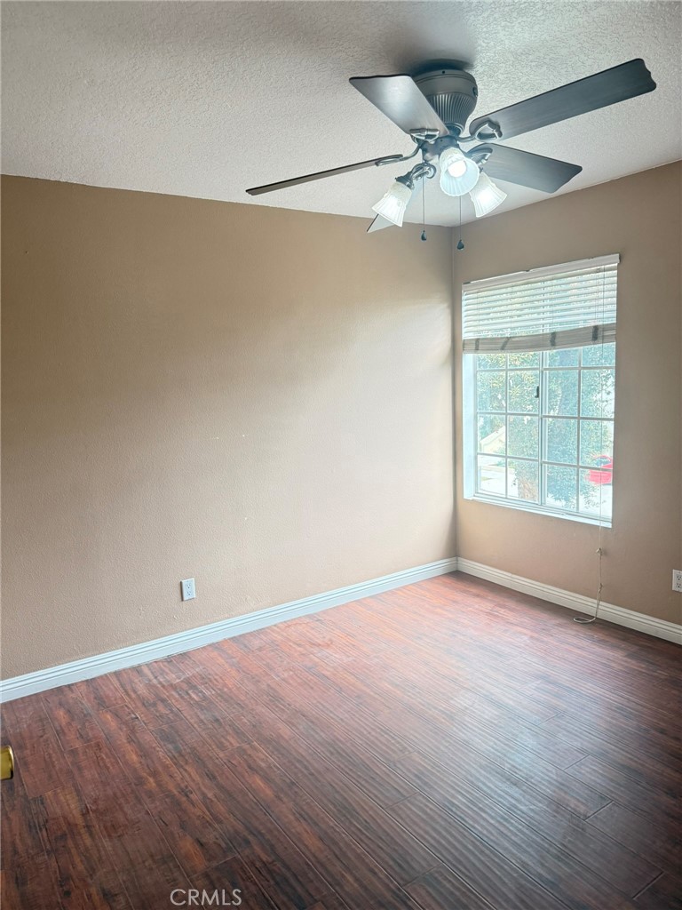 77 North Michigan Avenue, Unit 3 Pasadena, CA 91106 - Photo 10 of 10 wooden floor in an empty room with a window