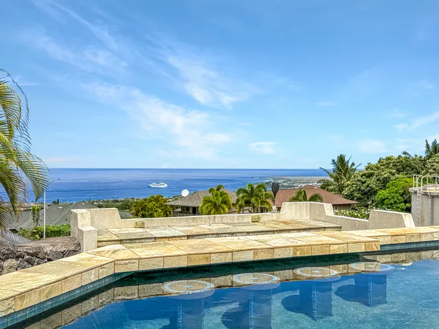 a view of swimming pool with ocean view