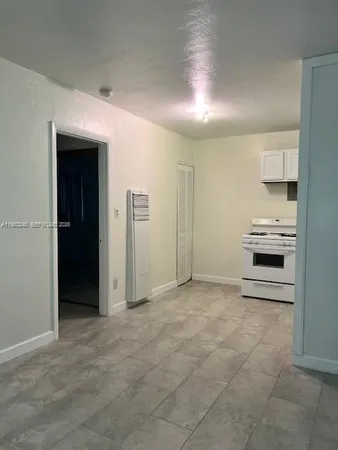 a view of a livingroom with a flat screen tv