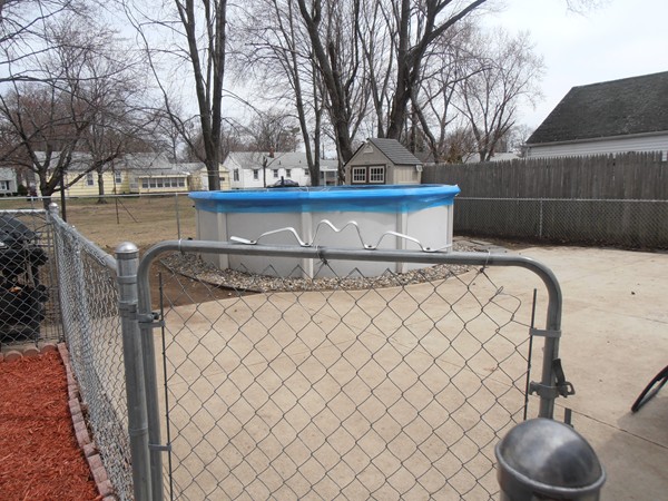 199 Eddy Street Springfield, MA 01104 - Photo 19 of 21 a view of a sink and dishwasher with wooden fence