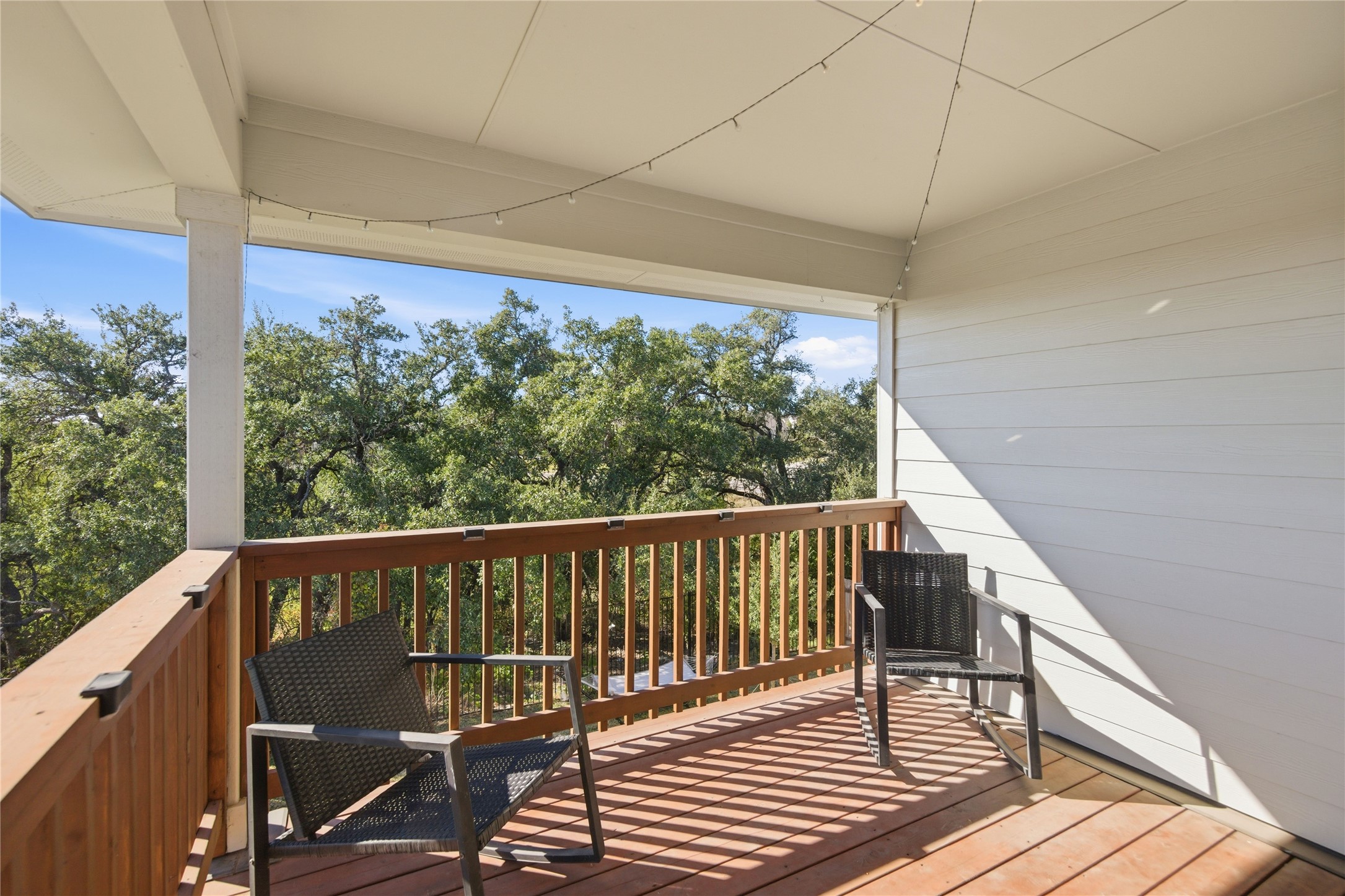 1008 Summer Glen Georgetown, TX 78628 - Photo 25 of 34 a view of balcony with wooden floor and fence
