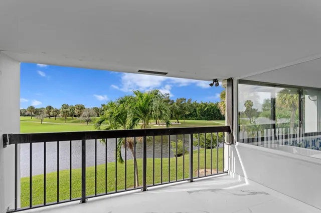 a view of balcony with furniture