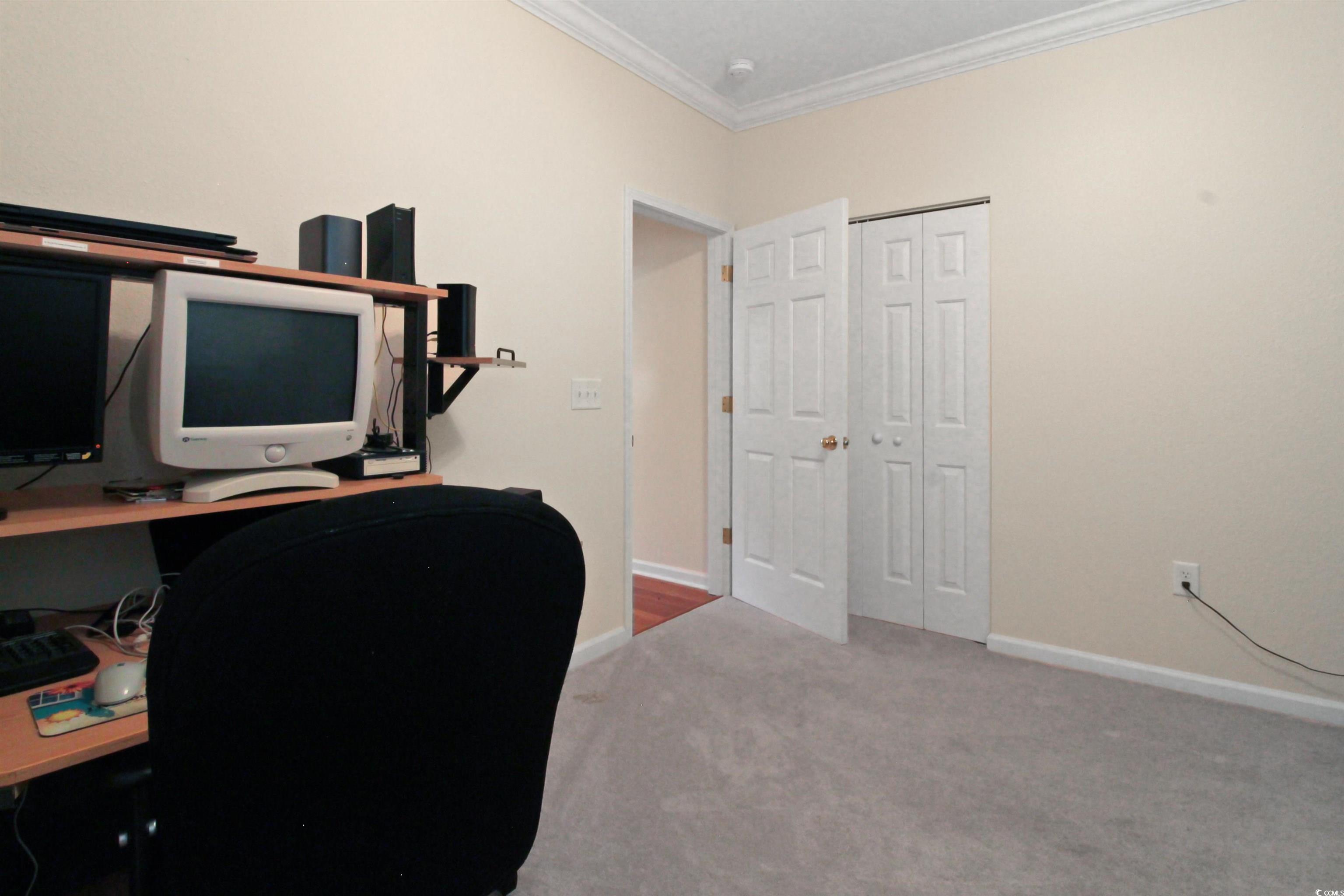 301 Nut Hatch Lane, Unit D Murrells Inlet, SC 29576 - Photo 26 of 40 Home office featuring ornamental molding and light colored carpet