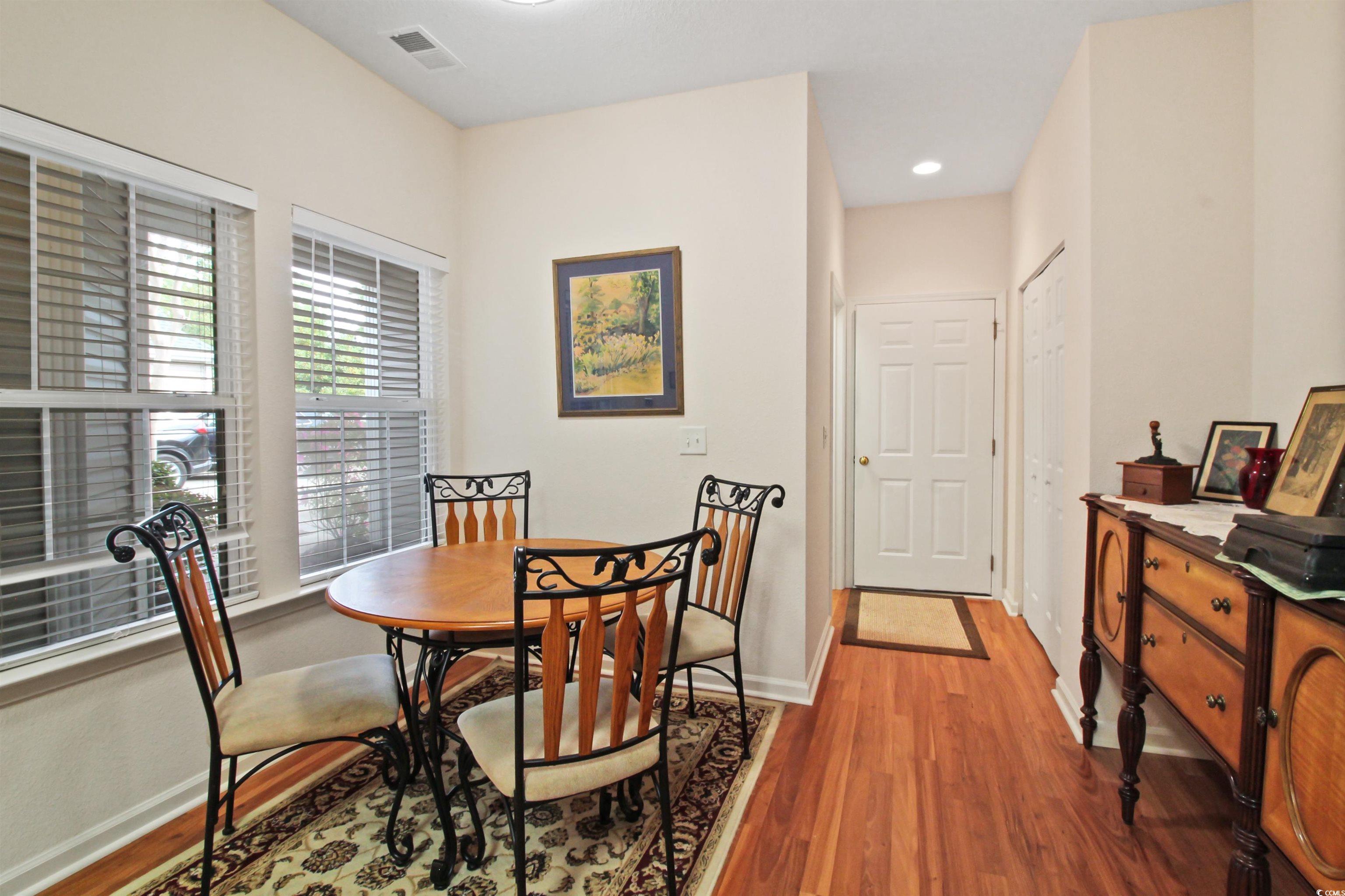 301 Nut Hatch Lane, Unit D Murrells Inlet, SC 29576 - Photo 8 of 40 Dining room featuring light wood-style flooring and recessed lighting