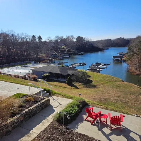 a view of a swimming pool and lake view