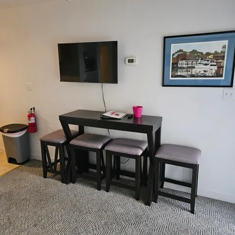 a view of a workspace with furniture