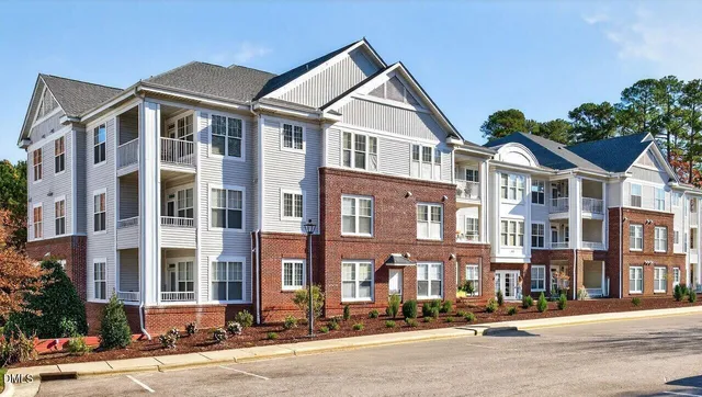 a front view of a building and a street