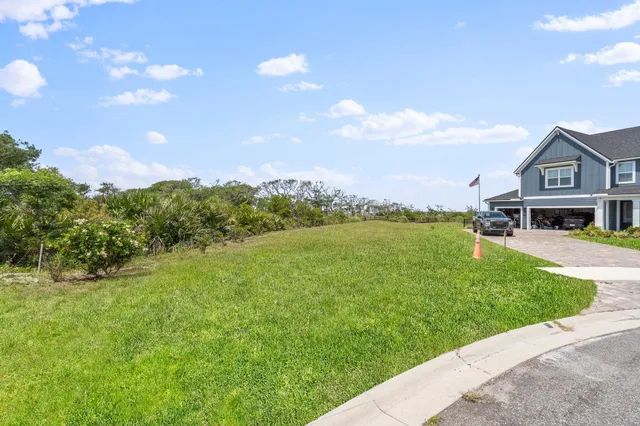 a view of a lake with a big yard
