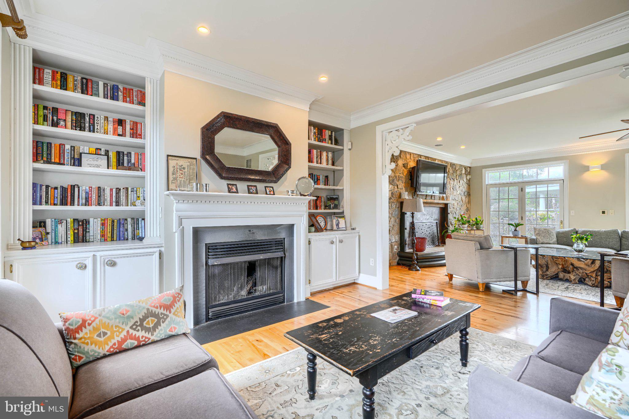 2415 Old Bosley Road Lutherville-Timonium, MD 21093 - Photo 11 of 65 a living room with furniture a rug and a fireplace