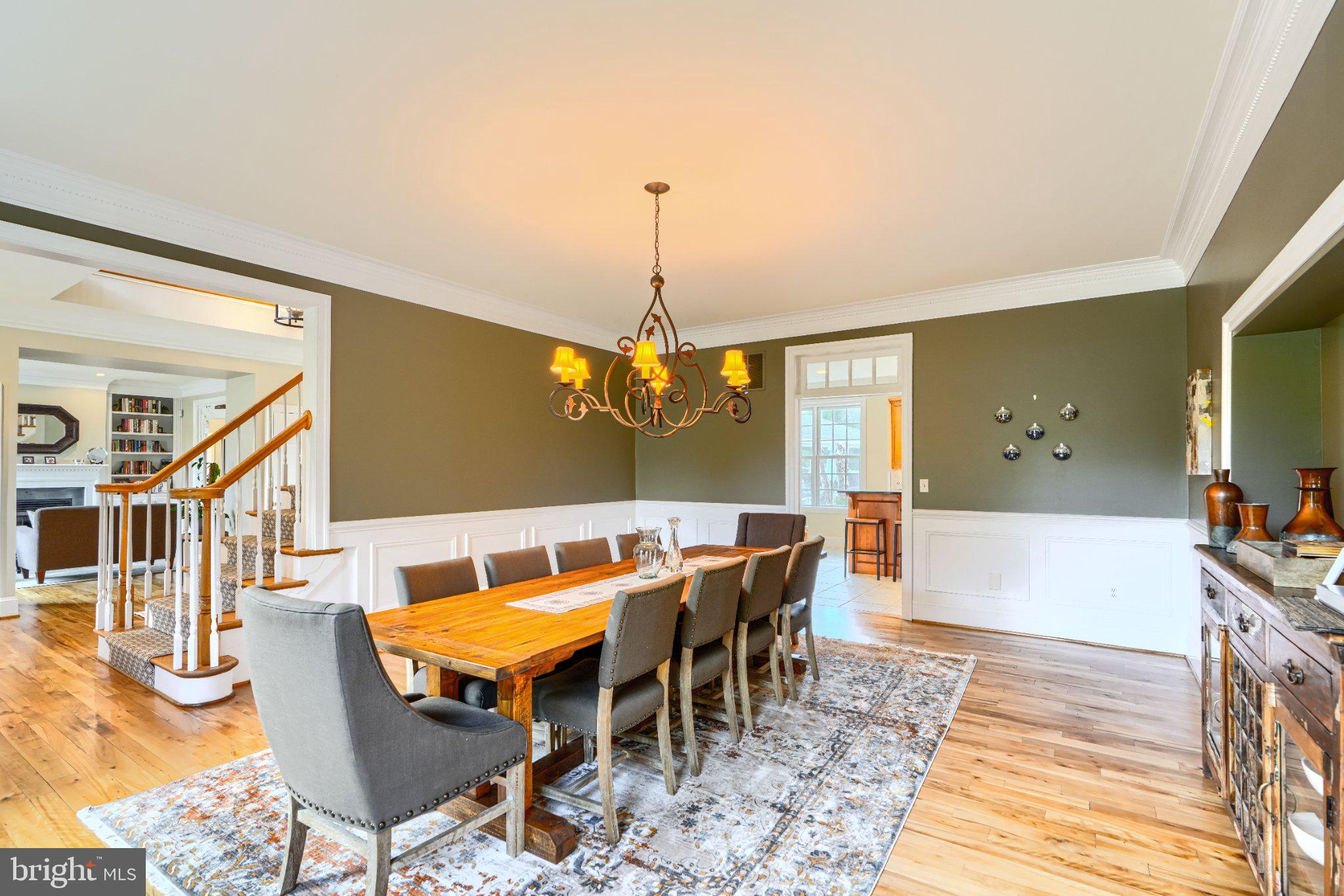 2415 Old Bosley Road Lutherville-Timonium, MD 21093 - Photo 18 of 65 a dining room with furniture a rug and wooden floor
