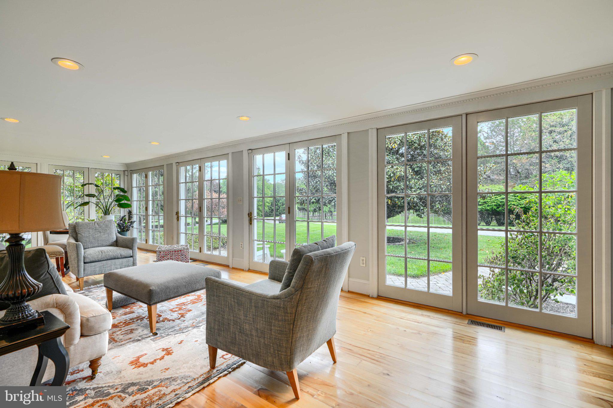 2415 Old Bosley Road Lutherville-Timonium, MD 21093 - Photo 19 of 65 a living room with furniture and a floor to ceiling window