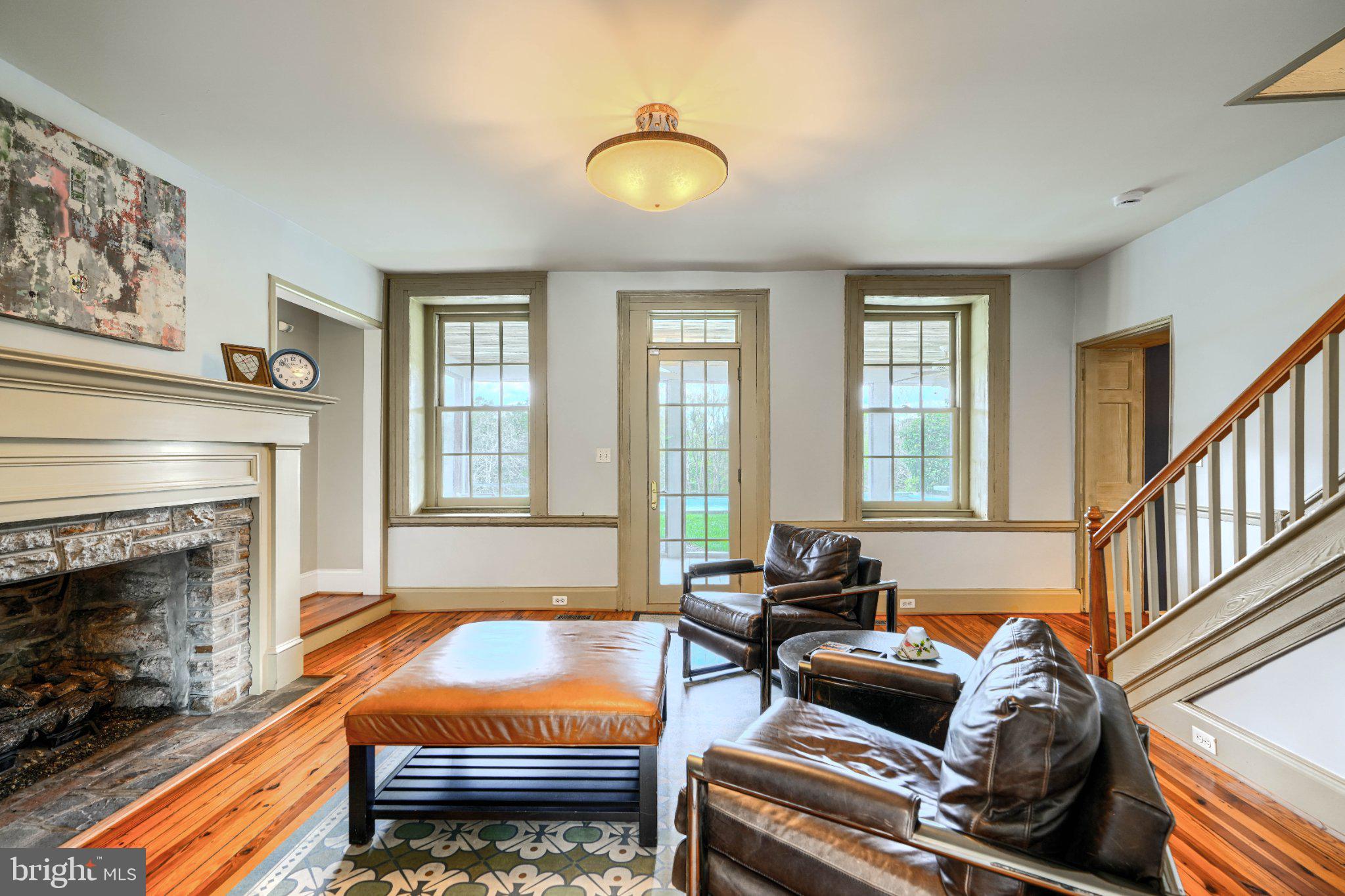 2415 Old Bosley Road Lutherville-Timonium, MD 21093 - Photo 24 of 65 a living room with furniture and a fireplace