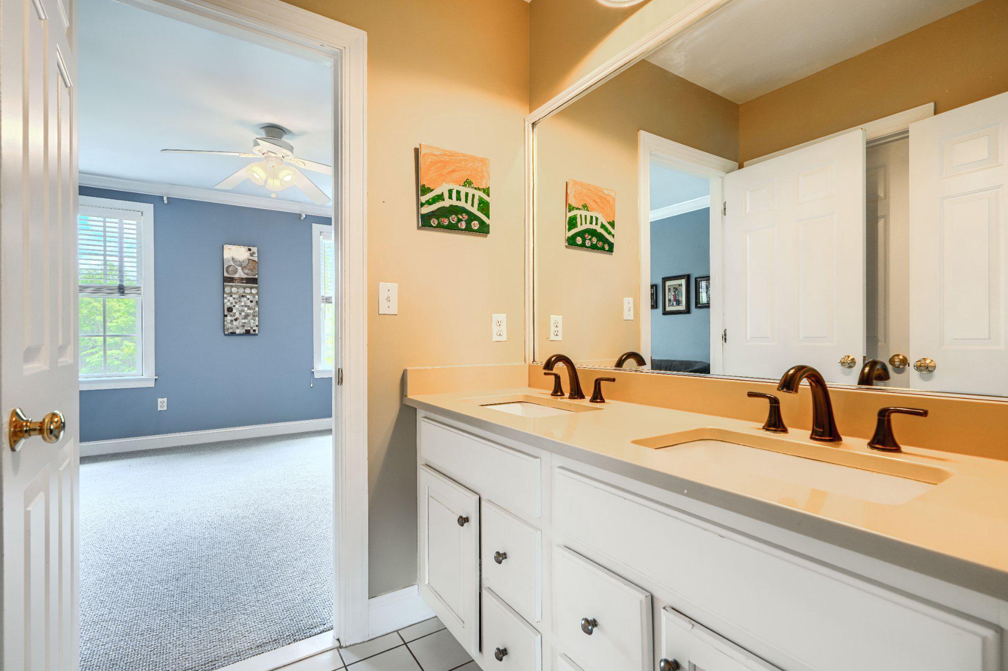 2415 Old Bosley Road Lutherville-Timonium, MD 21093 - Photo 36 of 65 a en suite bathroom with a sink and mirror