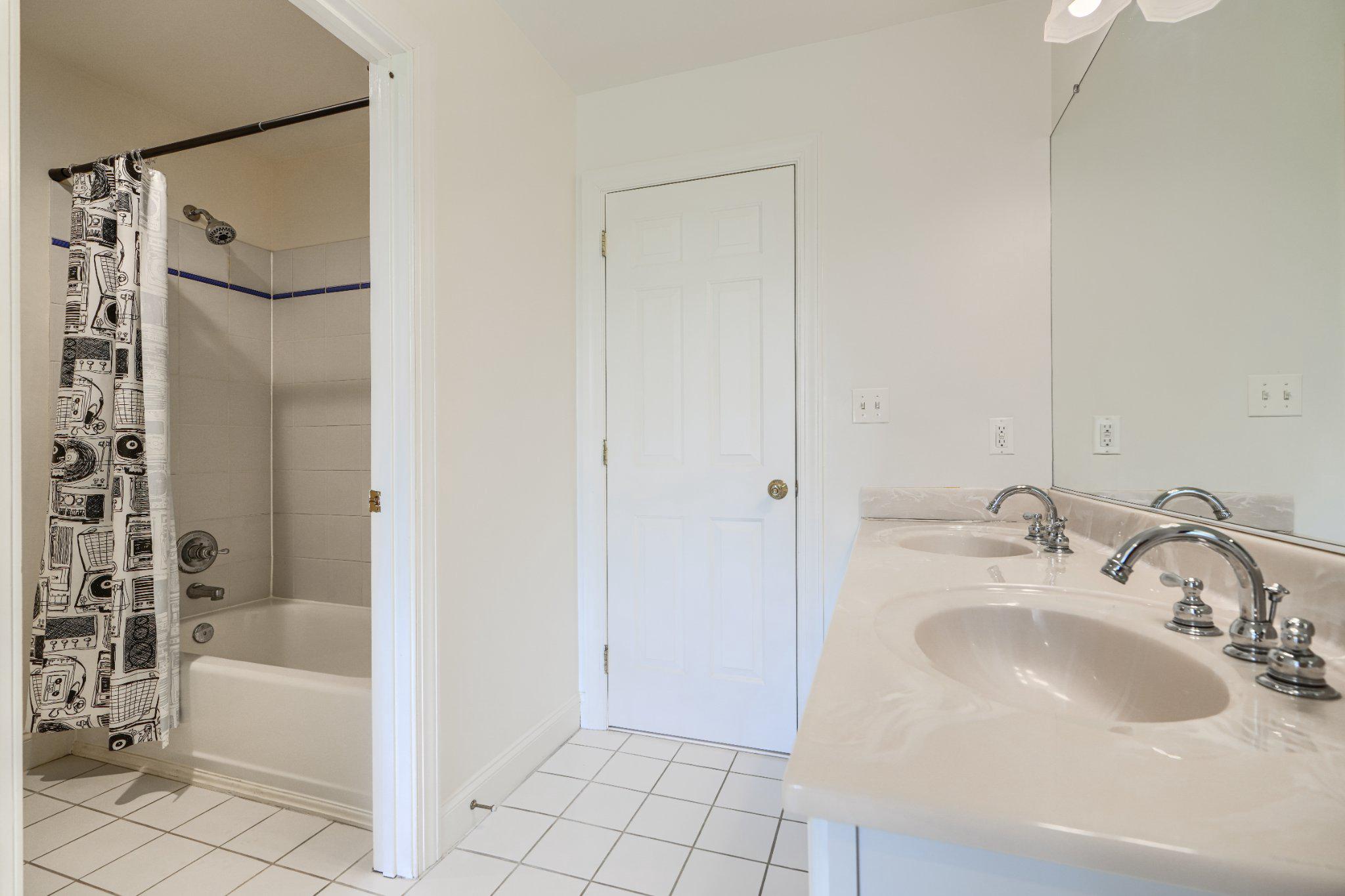 2415 Old Bosley Road Lutherville-Timonium, MD 21093 - Photo 49 of 65 a bathroom with a sink and a mirror
