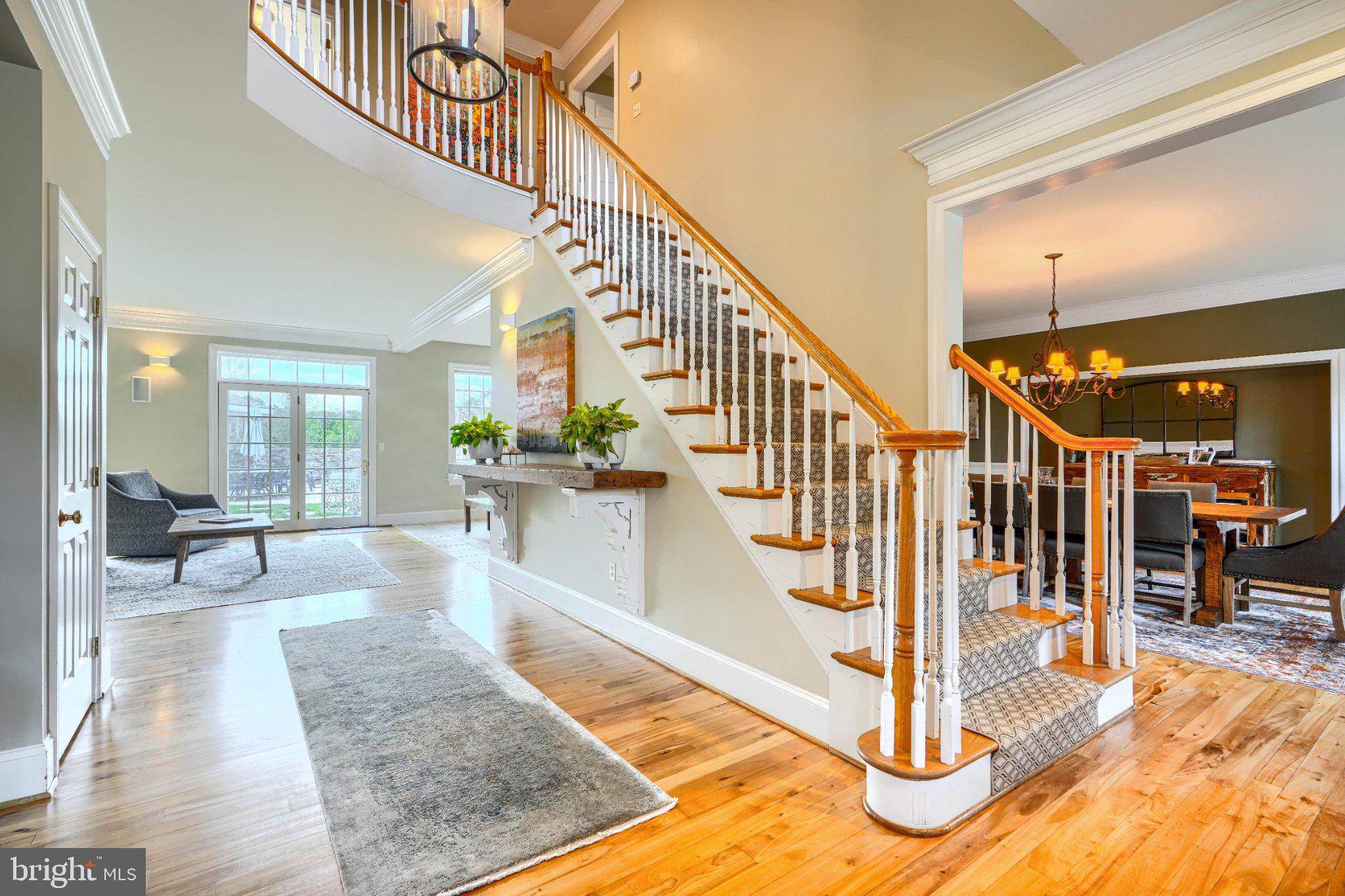 2415 Old Bosley Road Lutherville-Timonium, MD 21093 - Photo 5 of 65 Elegant foyer with grand staircase.