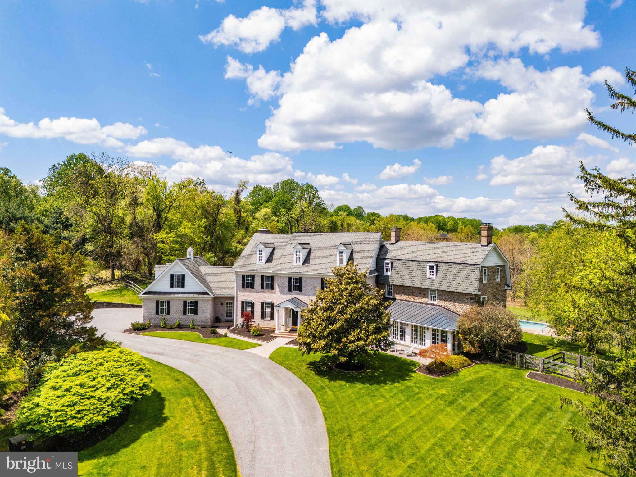2415 Old Bosley Road Lutherville-Timonium, MD 21093 - Photo 59 of 65 a aerial view of a house with a big yard and large trees