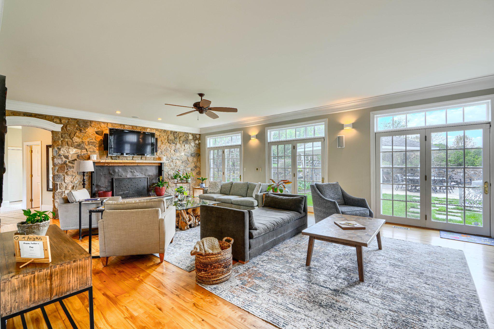 2415 Old Bosley Road Lutherville-Timonium, MD 21093 - Photo 8 of 65 a living room with furniture and a floor to ceiling window