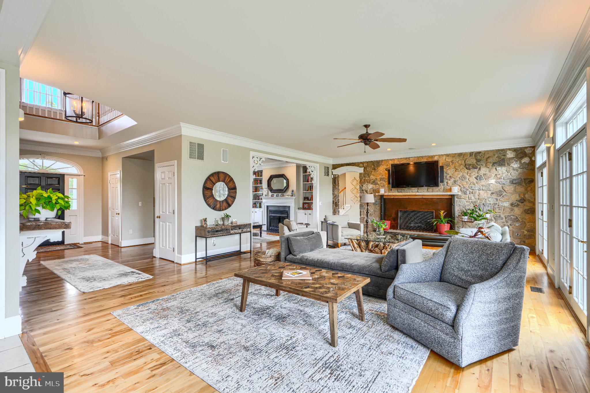 2415 Old Bosley Road Lutherville-Timonium, MD 21093 - Photo 9 of 65 a living room with fireplace furniture and a rug