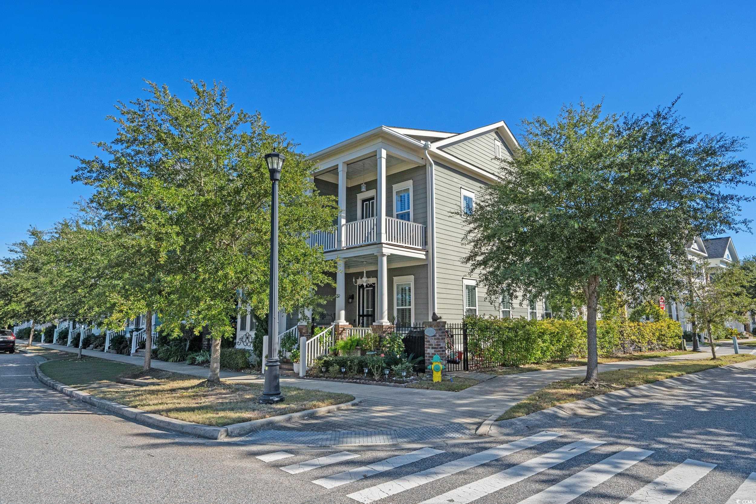927 Iris Street Myrtle Beach, SC 29577 - Photo 3 of 40 View of front of property with a porch