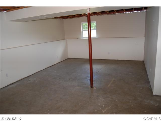 704 Eastham Road Bumpass, VA 23024 - Photo 11 of 12 Exterior Front - unfinished room on lower level