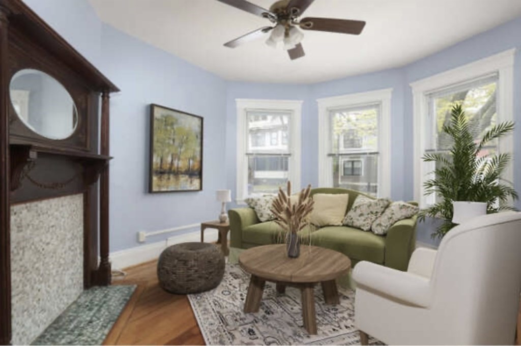 22 Winslow Road Brookline, MA 02446 - Photo 2 of 10 a living room with furniture and a large window