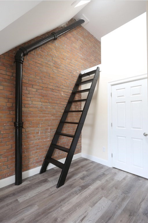 22 Winslow Road Brookline, MA 02446 - Photo 9 of 10 a view of entryway with wooden floor