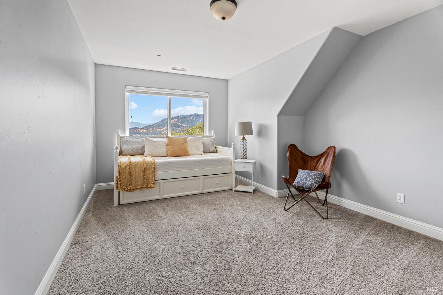 4561 Lake Ridge Road Ukiah, CA 95482 - Photo 29 of 52 a living room with furniture and a window