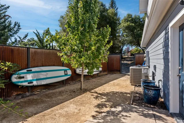 a view of a backyard with furniture
