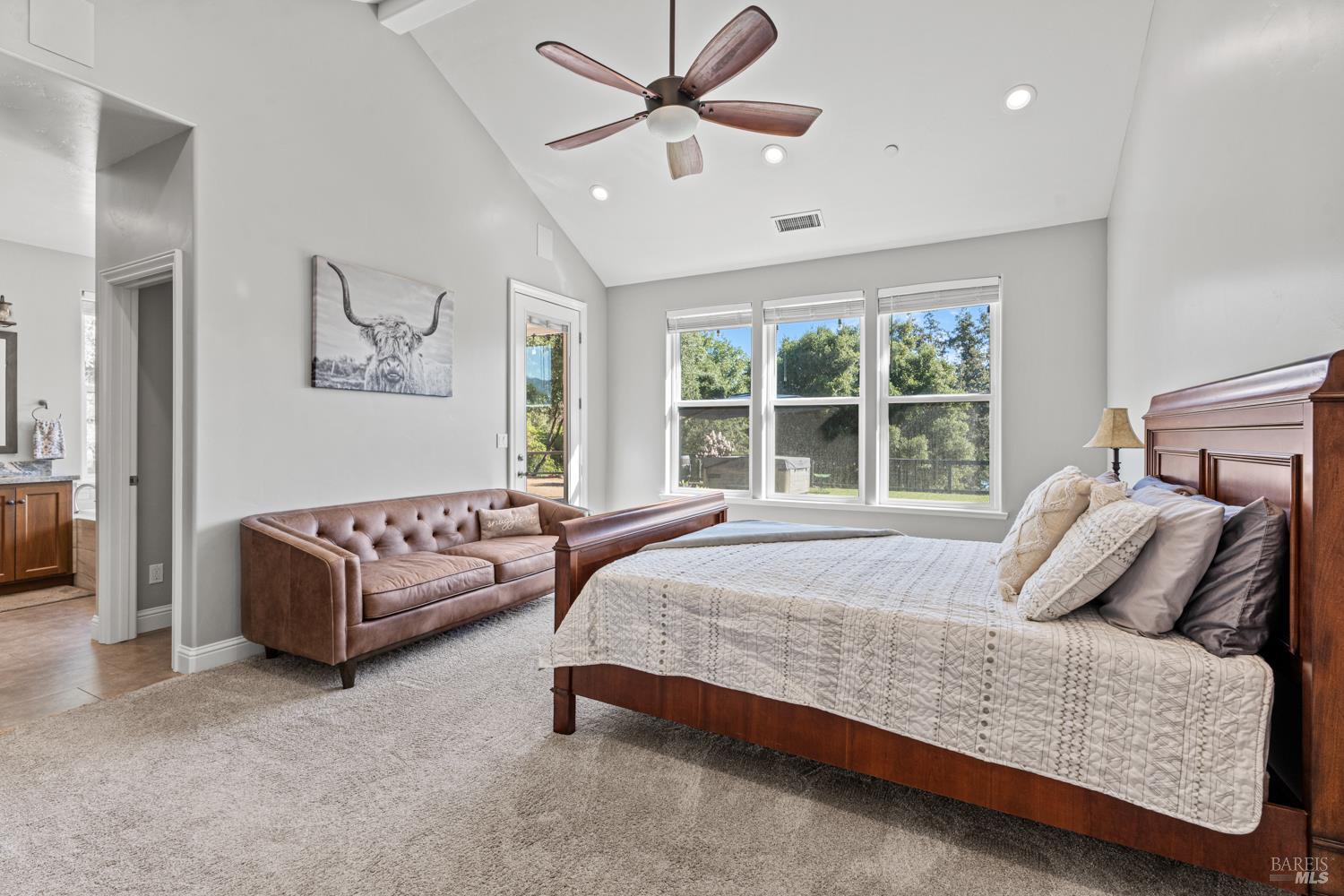 4561 Lake Ridge Road Ukiah, CA 95482 - Photo 6 of 52 a bedroom with a bed couch and window