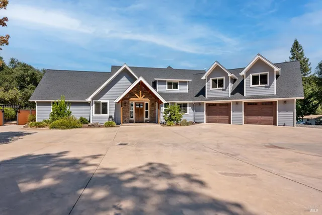 a front view of house with yard