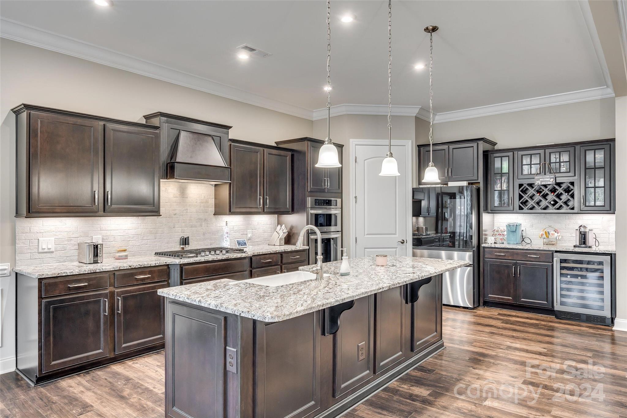 1156 Castle Road Fort Mill, SC 29707 - Photo 13 of 34 a kitchen with stainless steel appliances granite countertop a sink stove and refrigerator