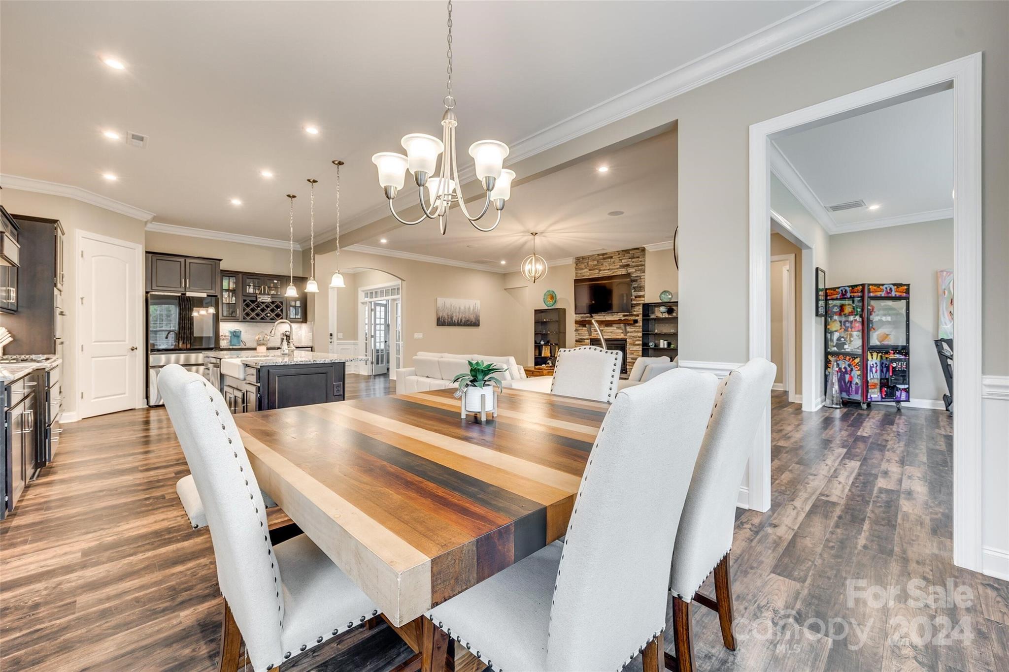 1156 Castle Road Fort Mill, SC 29707 - Photo 17 of 34 a view of a dining area with furniture and wooden floor